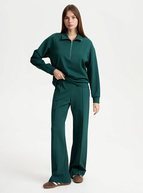 картинка Брюки широкие изумруд от магазина ICNTPRY